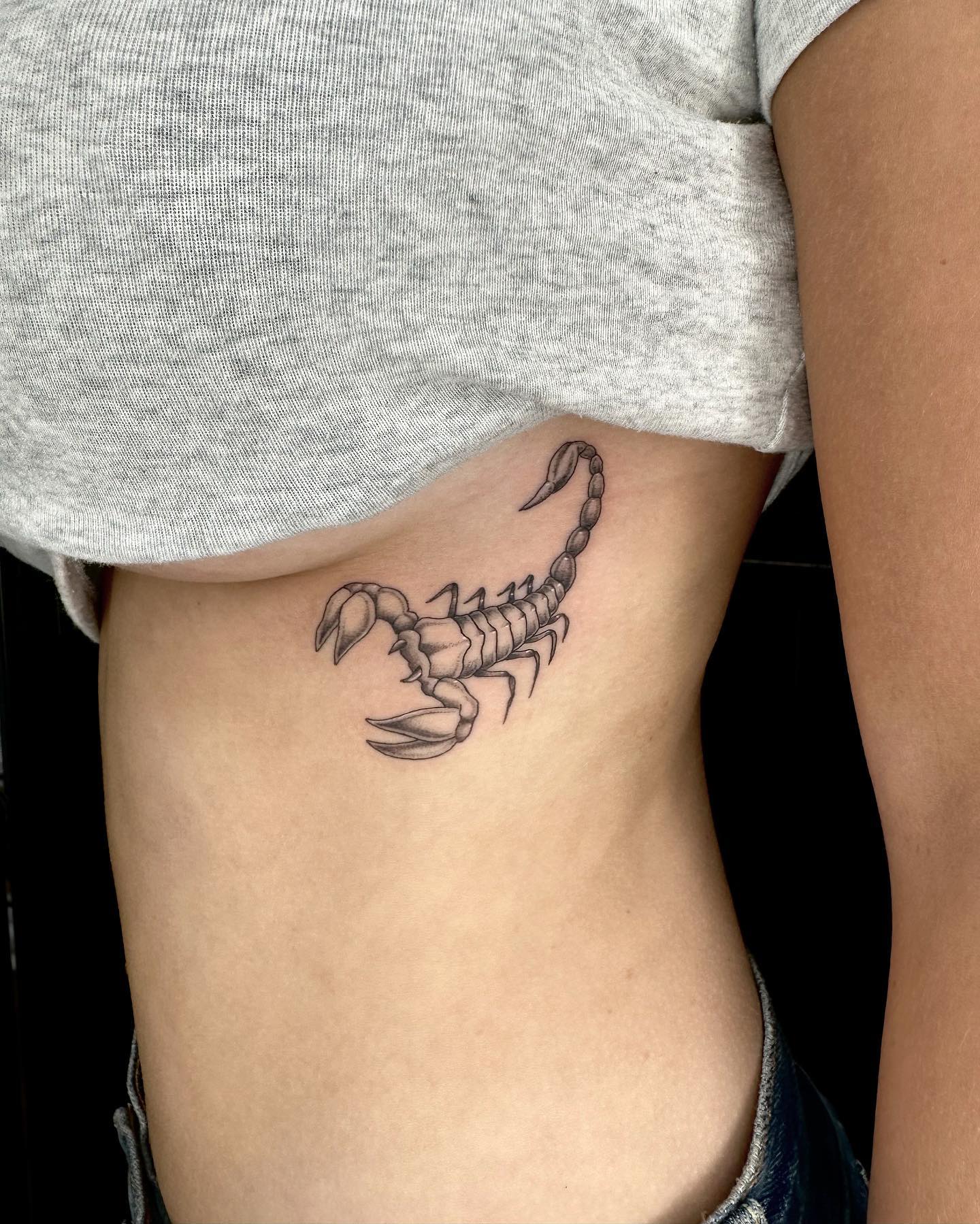 Scorpion-Heart Rib Tattoo