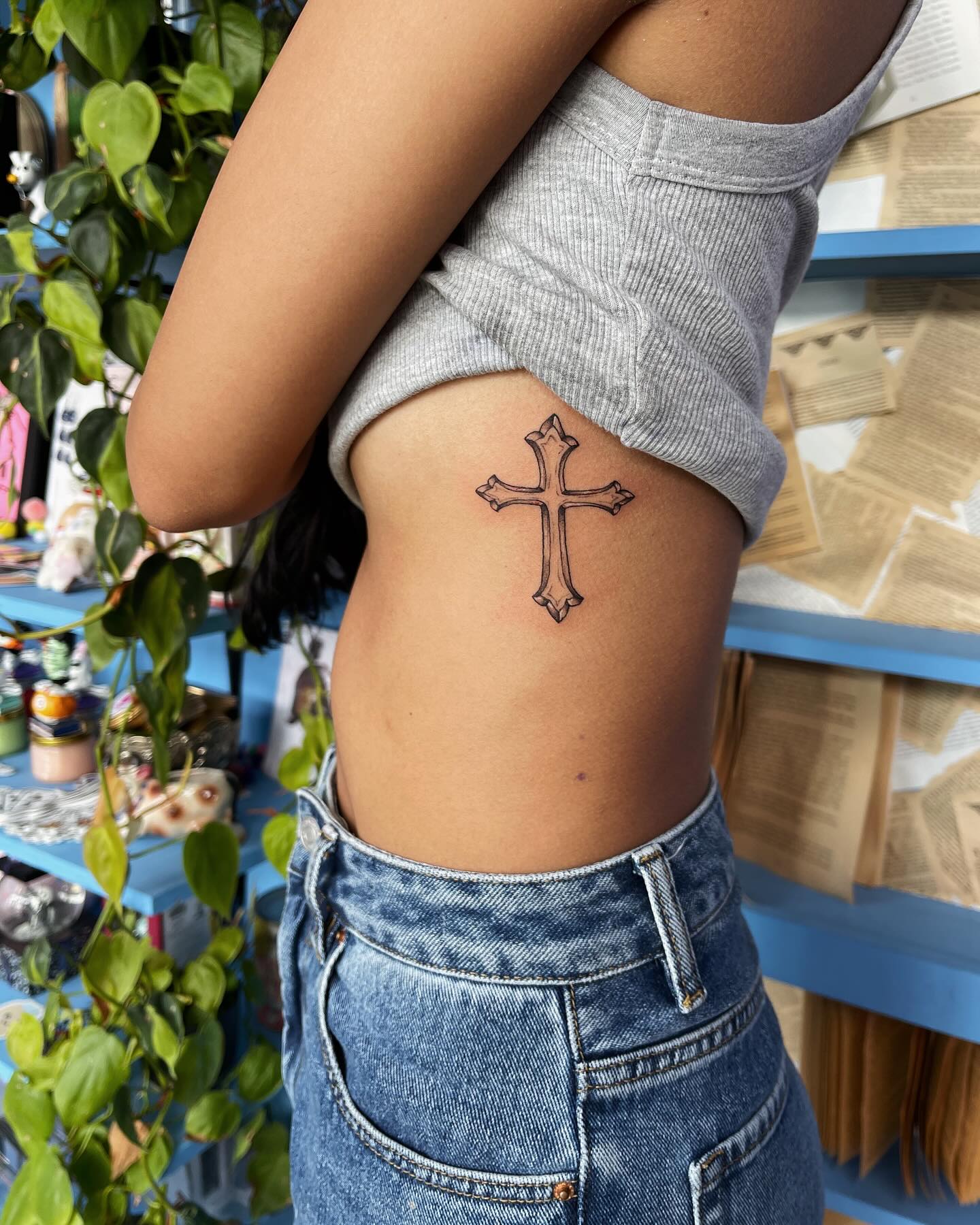 Black Cross Rib Tattoo
