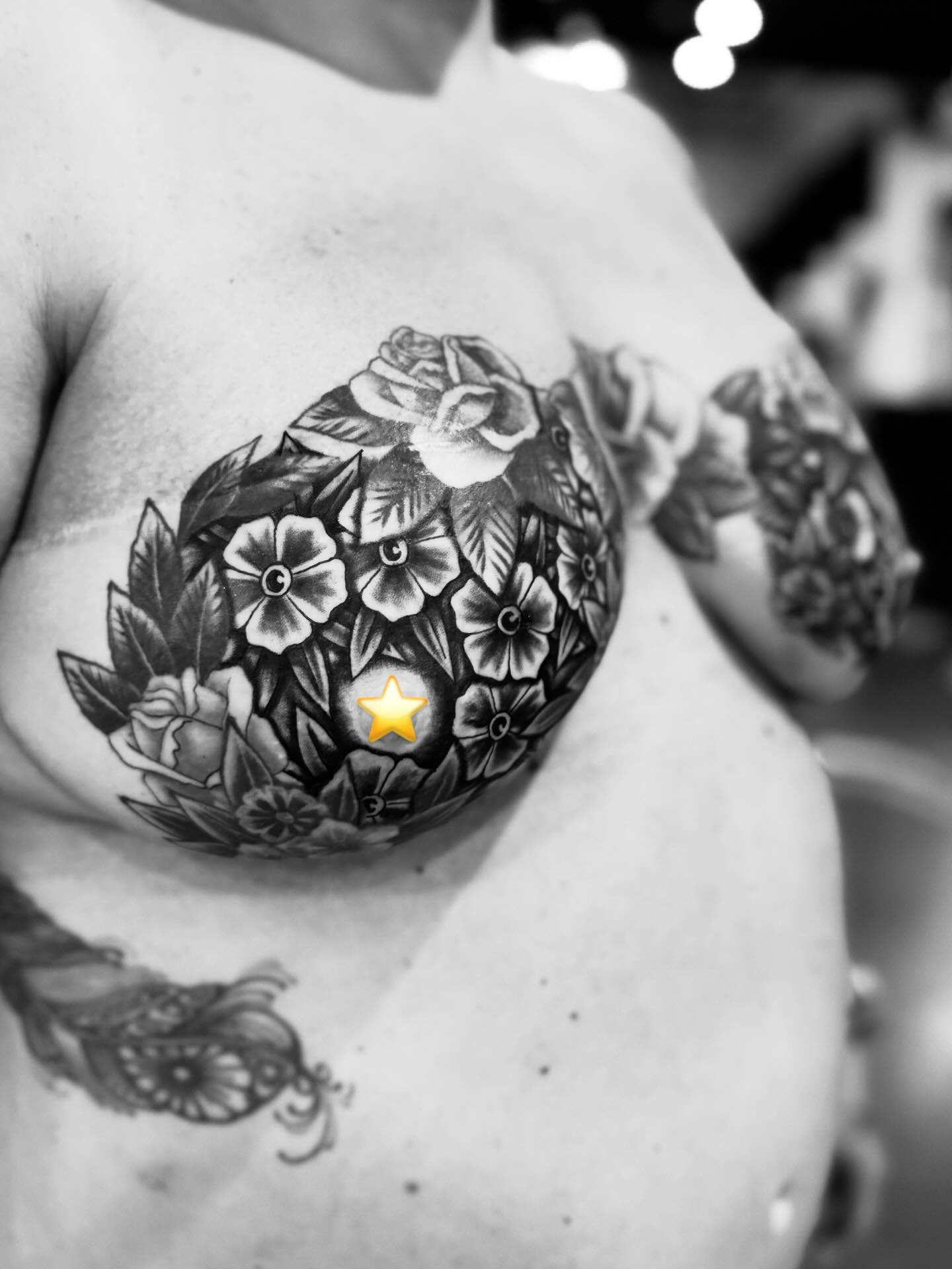 Floral Heartburst Breast Tattoo