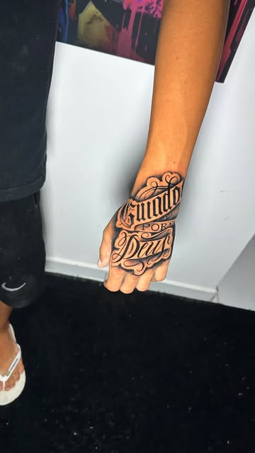 Lettering Hand Tattoo