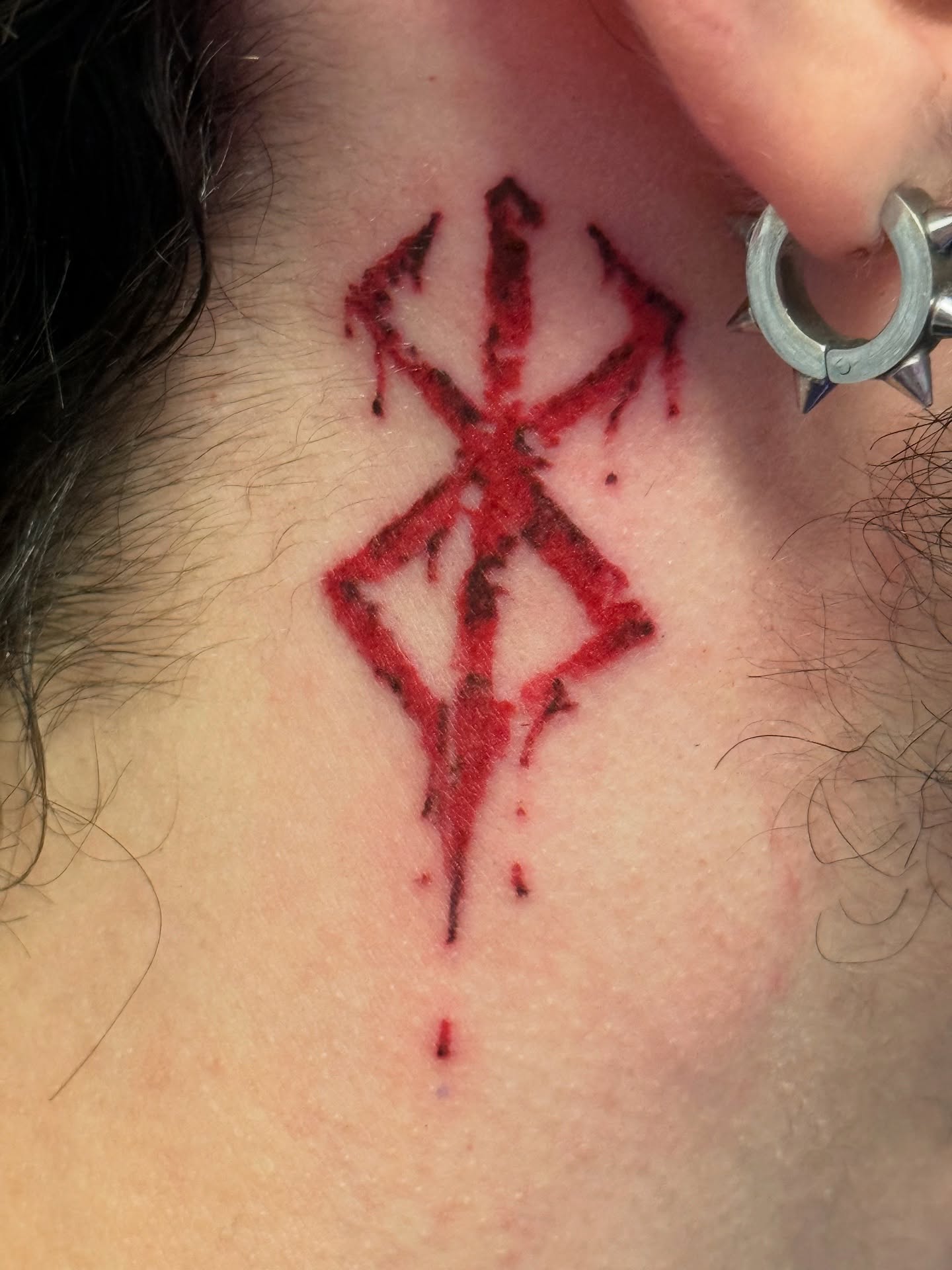 Blood Symbol Neck Tattoo
