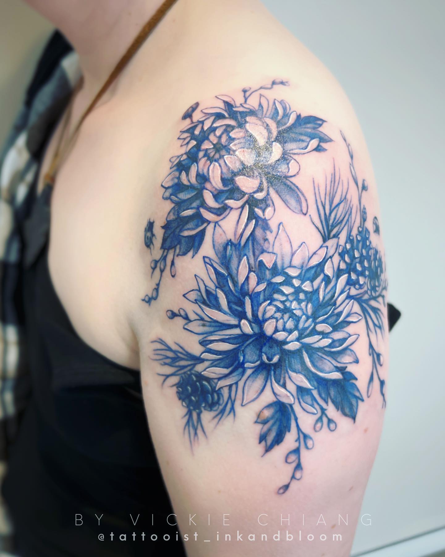 Blue Ink Floral Tattoo