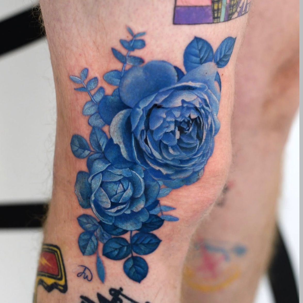 Blue Ink Roses Tattoo
