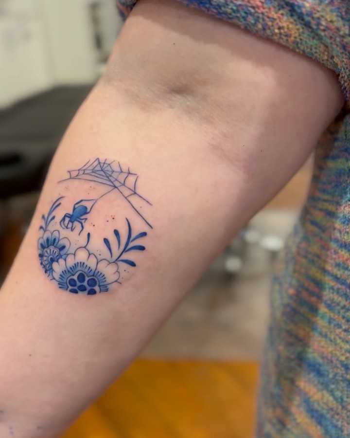 Delicate Blue Spider Tattoo
