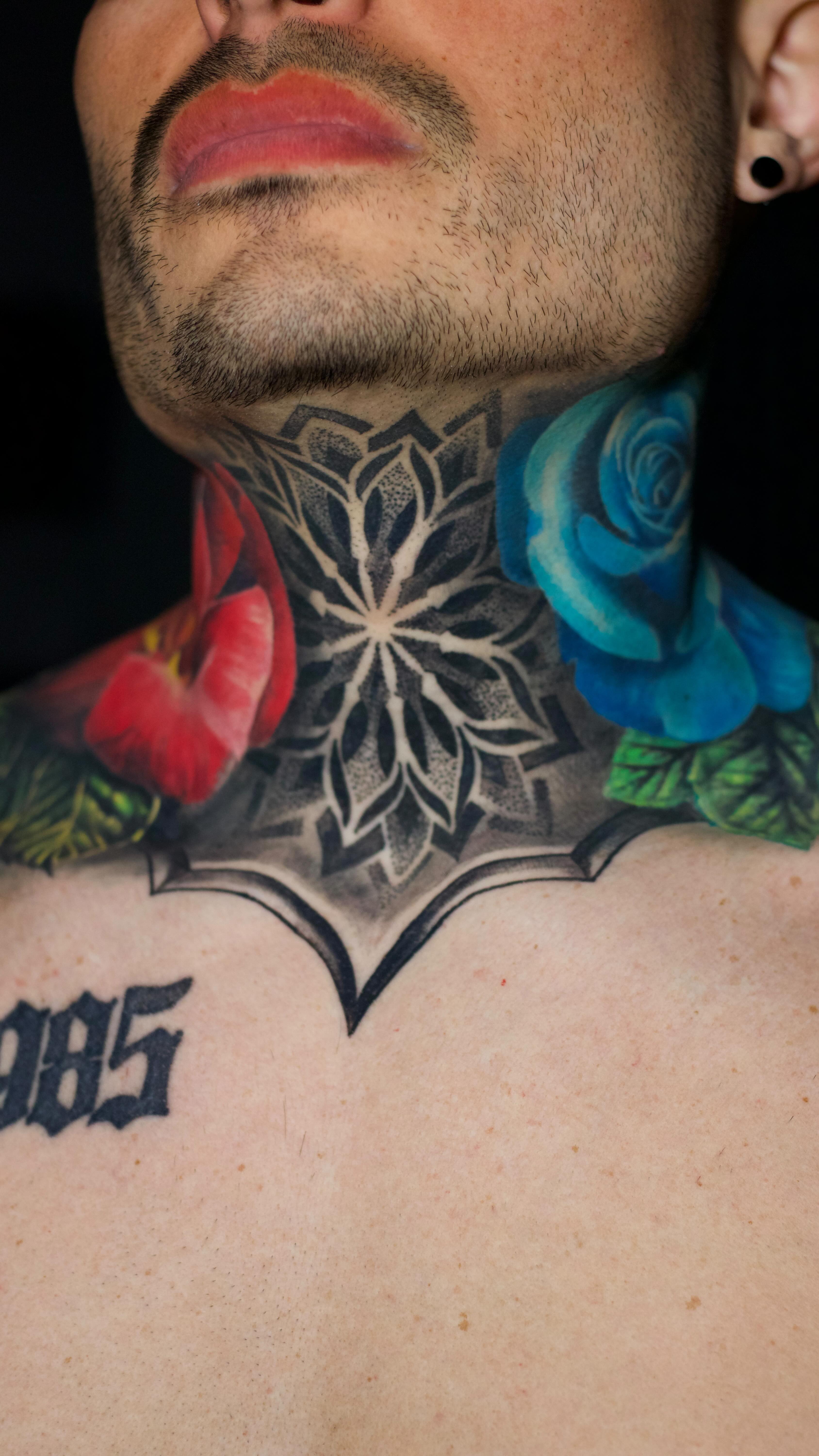Bold Floral Neck Tattoo