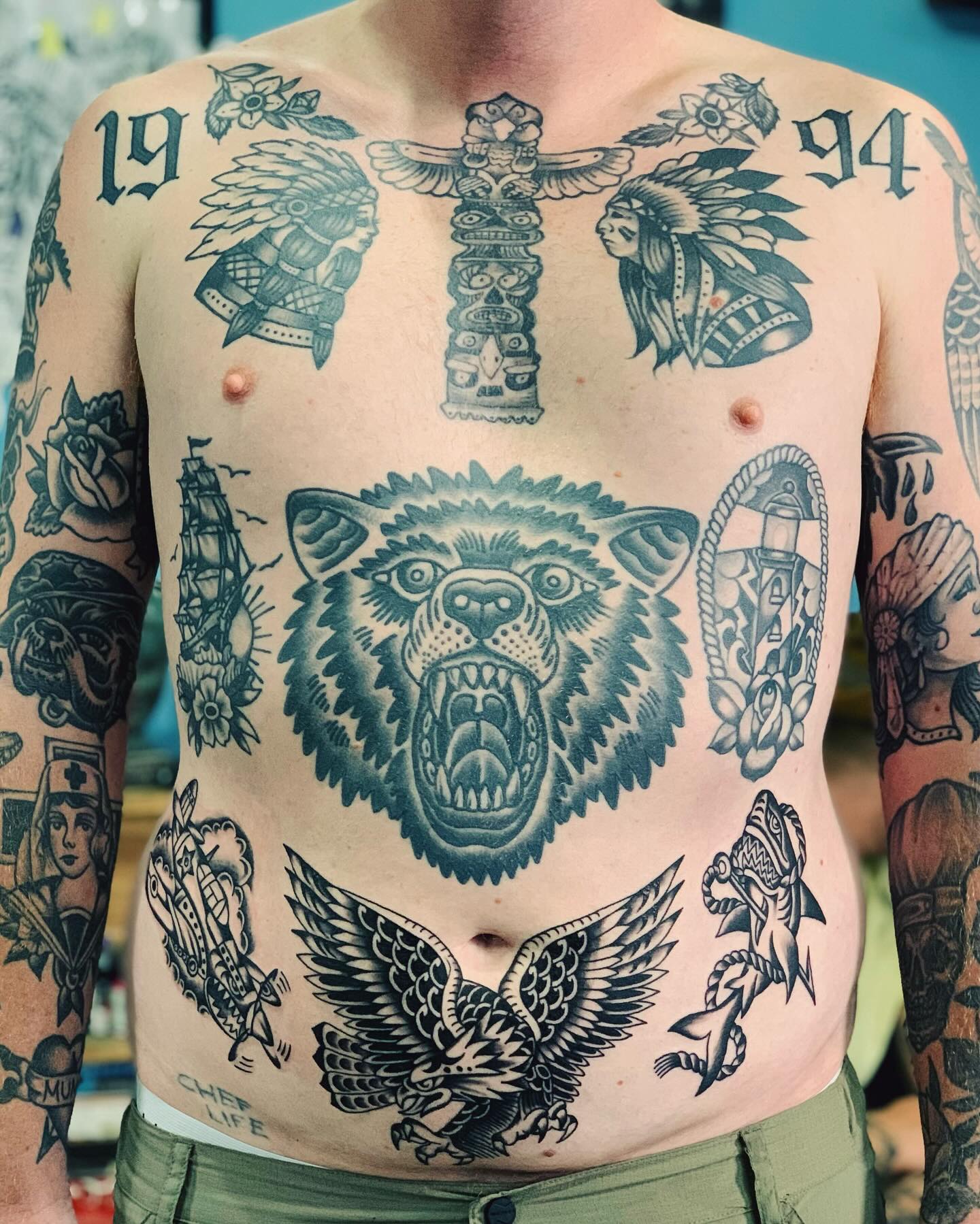 Bold Traditional Stomach Tattoo