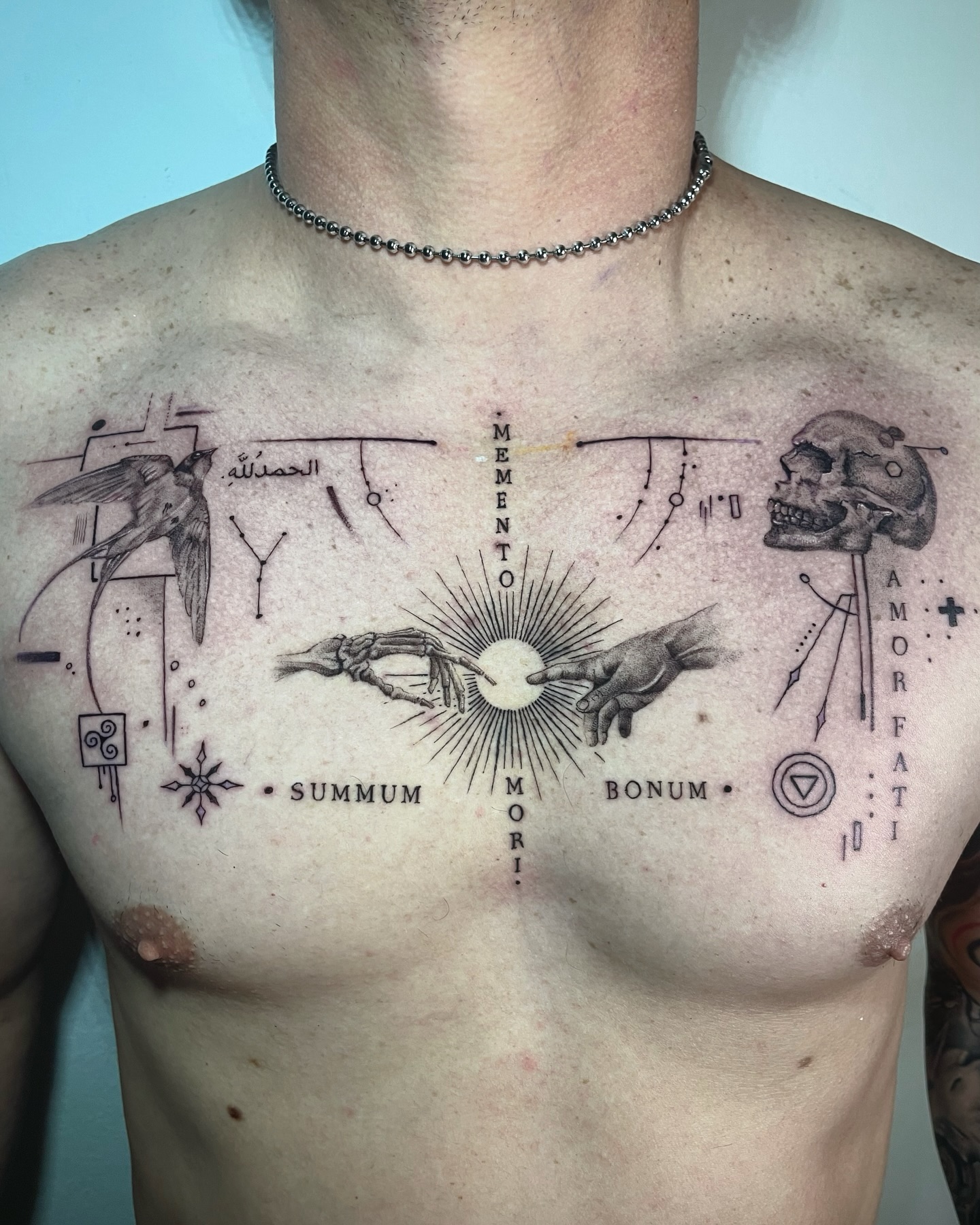 Chest Symbolism Tattoo