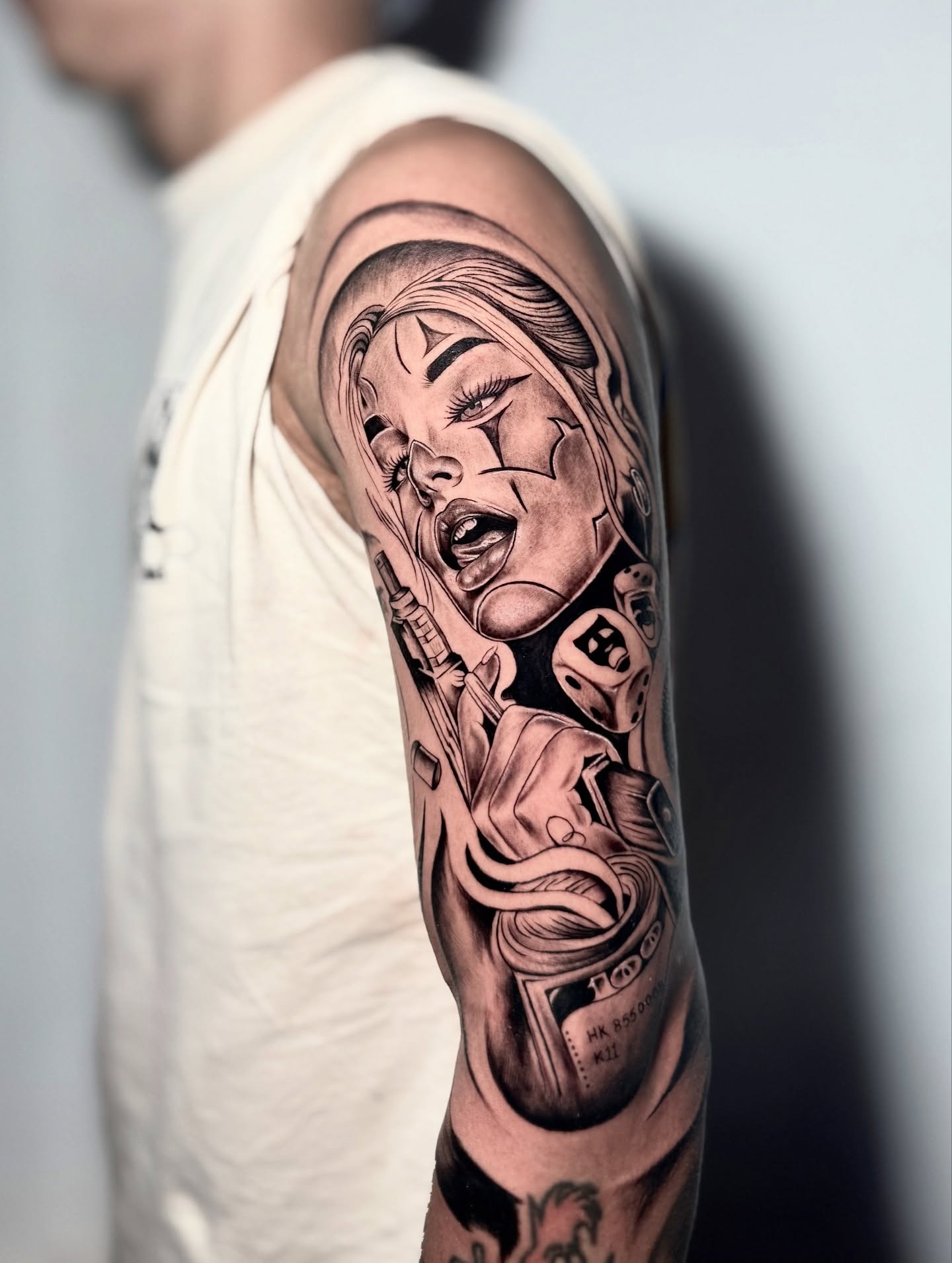 Chicano Style Arm Tattoo