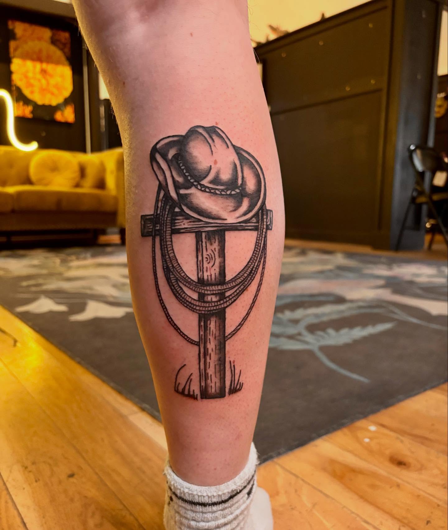 Cowboy Hat and Rope Tattoo