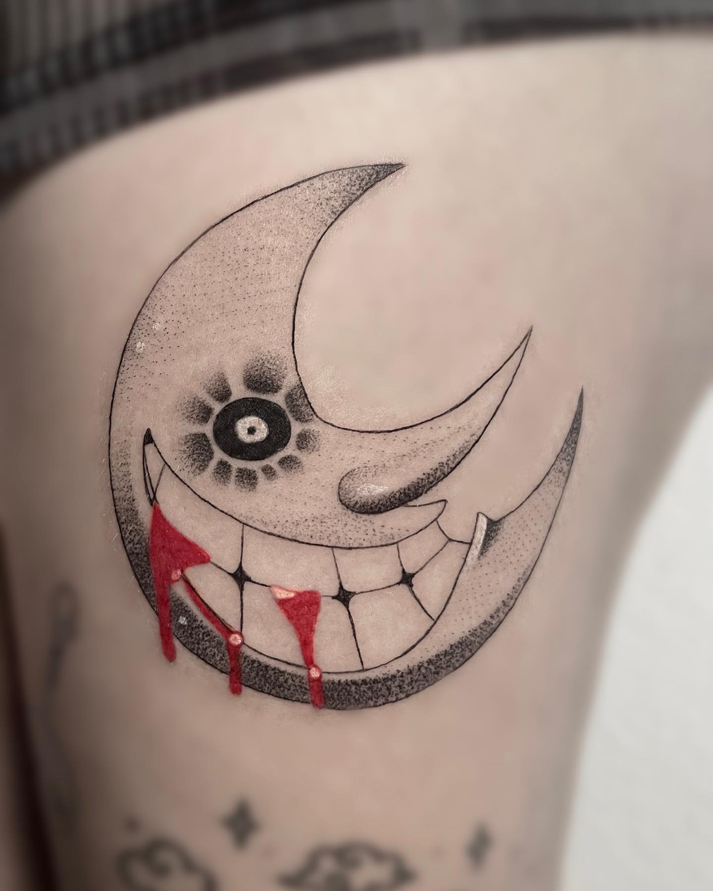 Crescent Moon Grin Tattoo