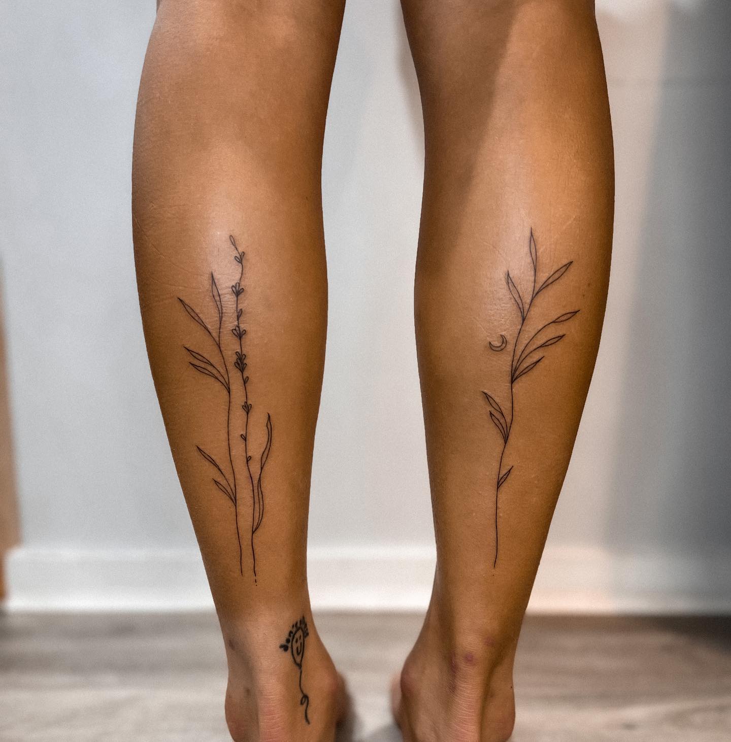 Delicate Botanical Calf Tattoos
