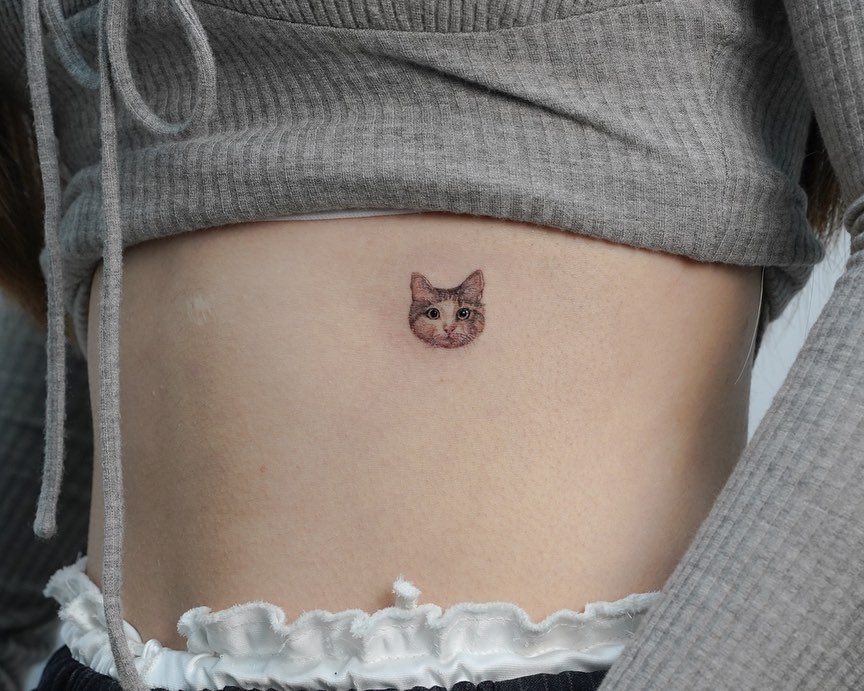 Delicate Cat Belly Tattoo