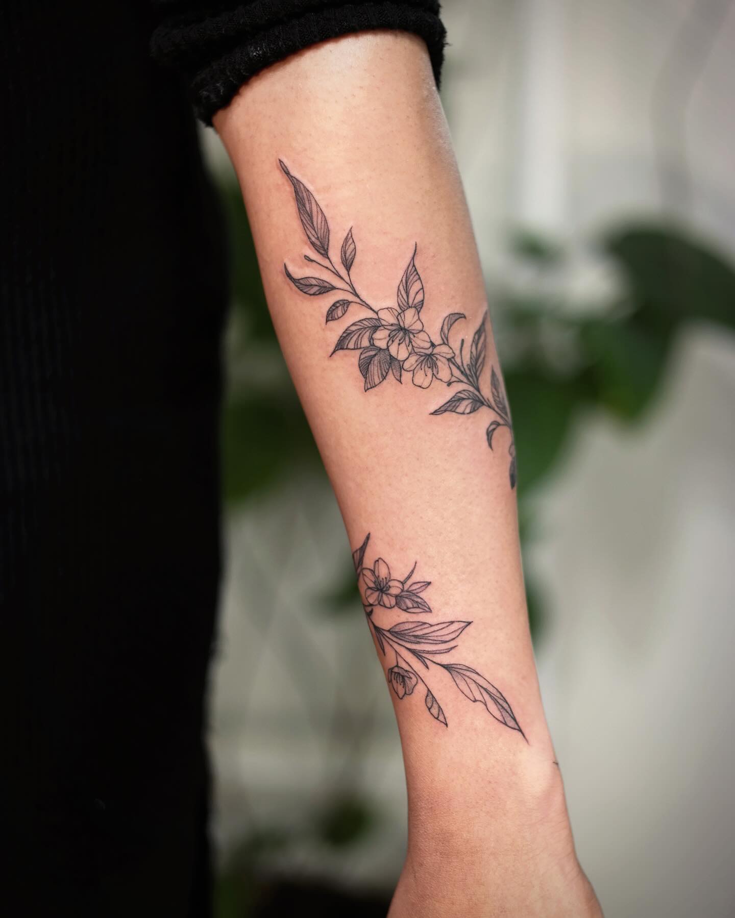 Delicate Floral Arm Tattoo