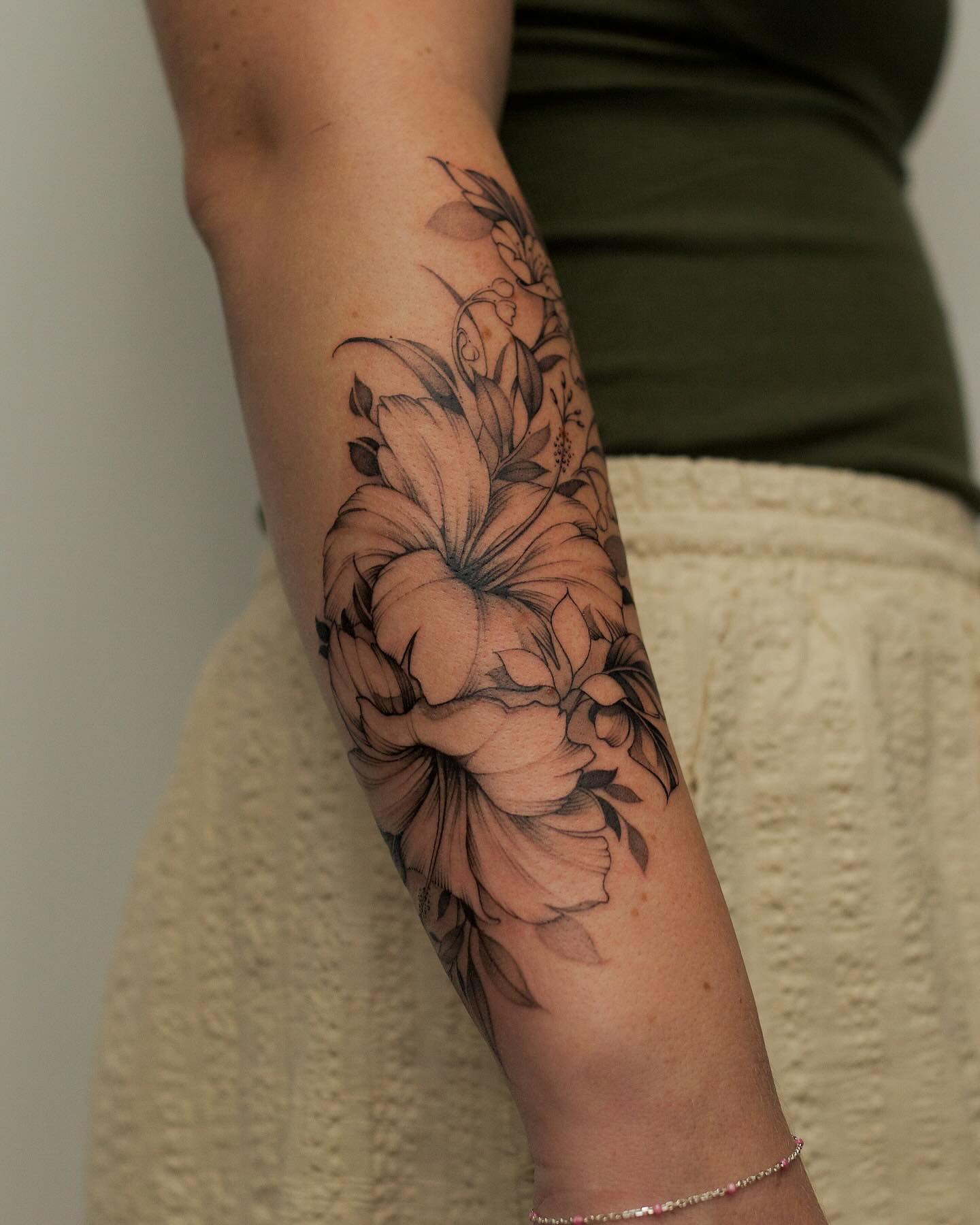 Delicate Floral Arm Tattoo