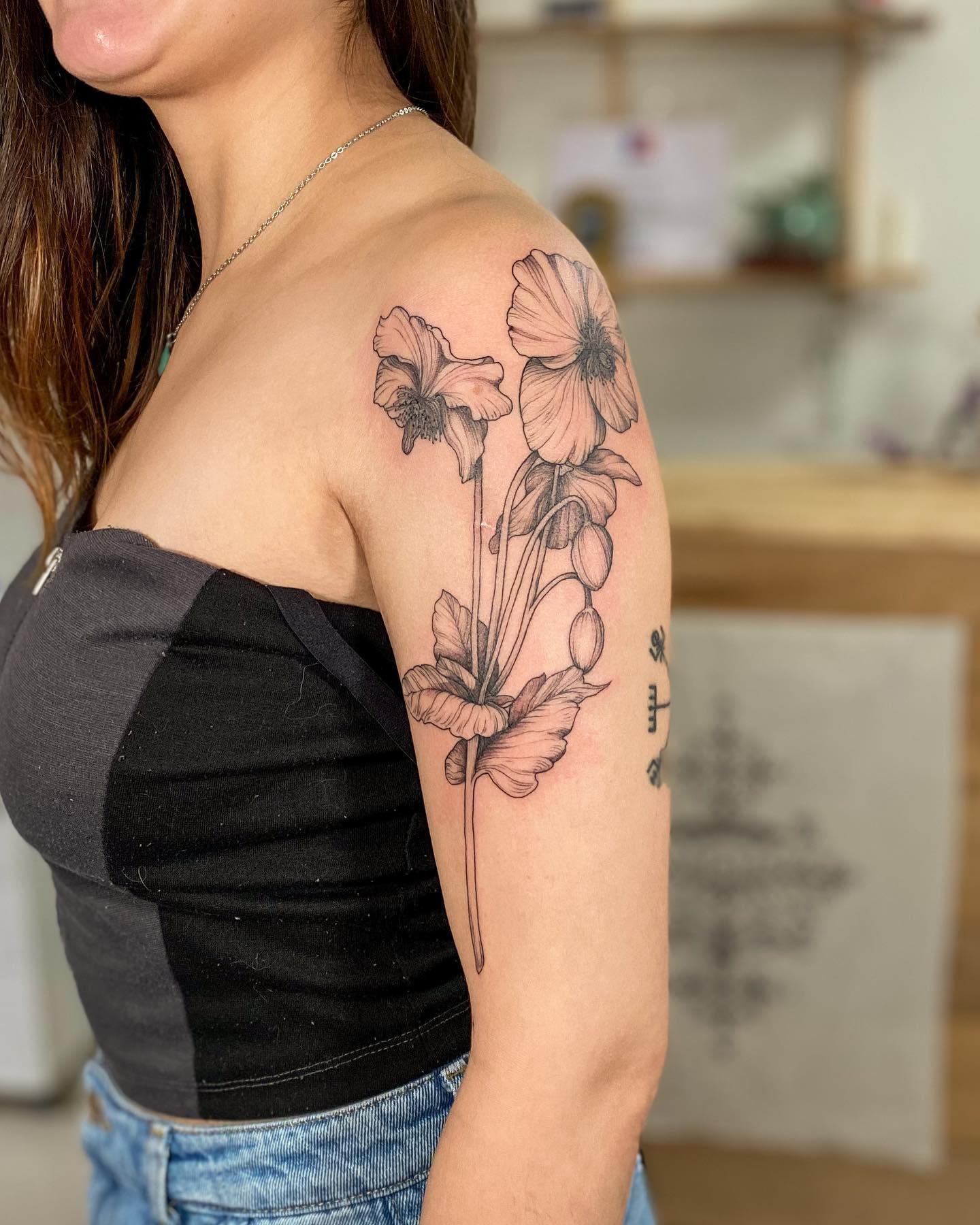 Delicate Floral Arm Tattoo