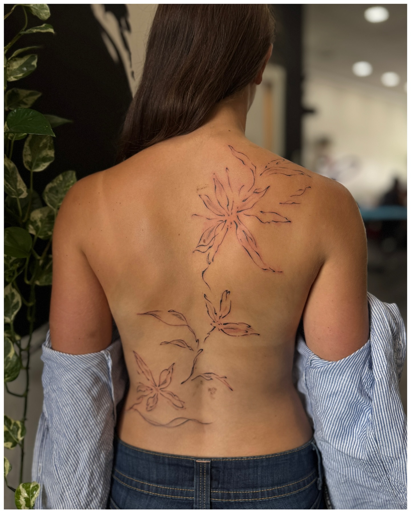 Delicate Floral Outline Tattoo