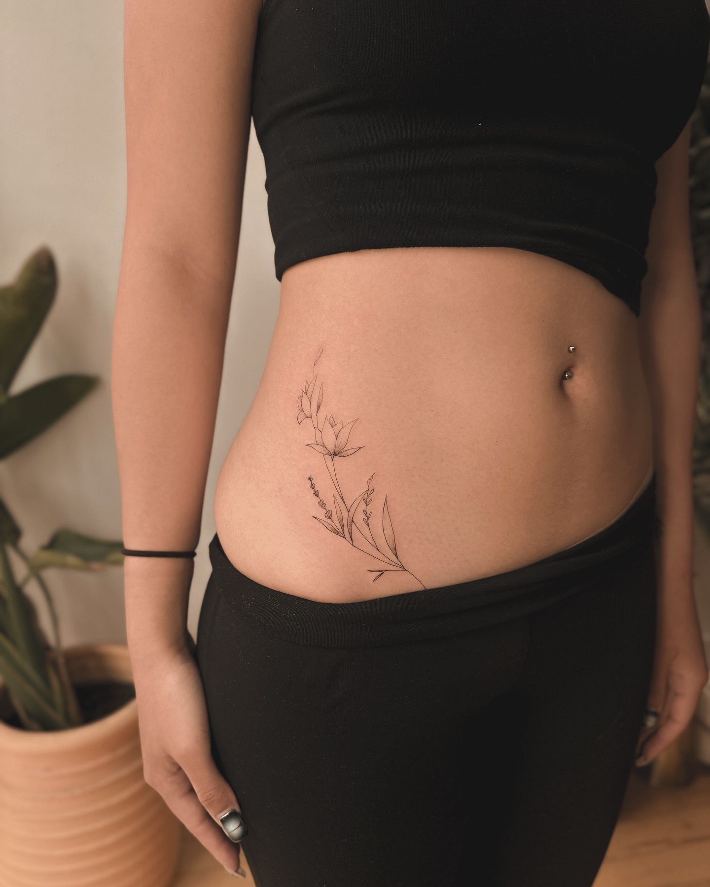 Delicate Floral Side Tattoo