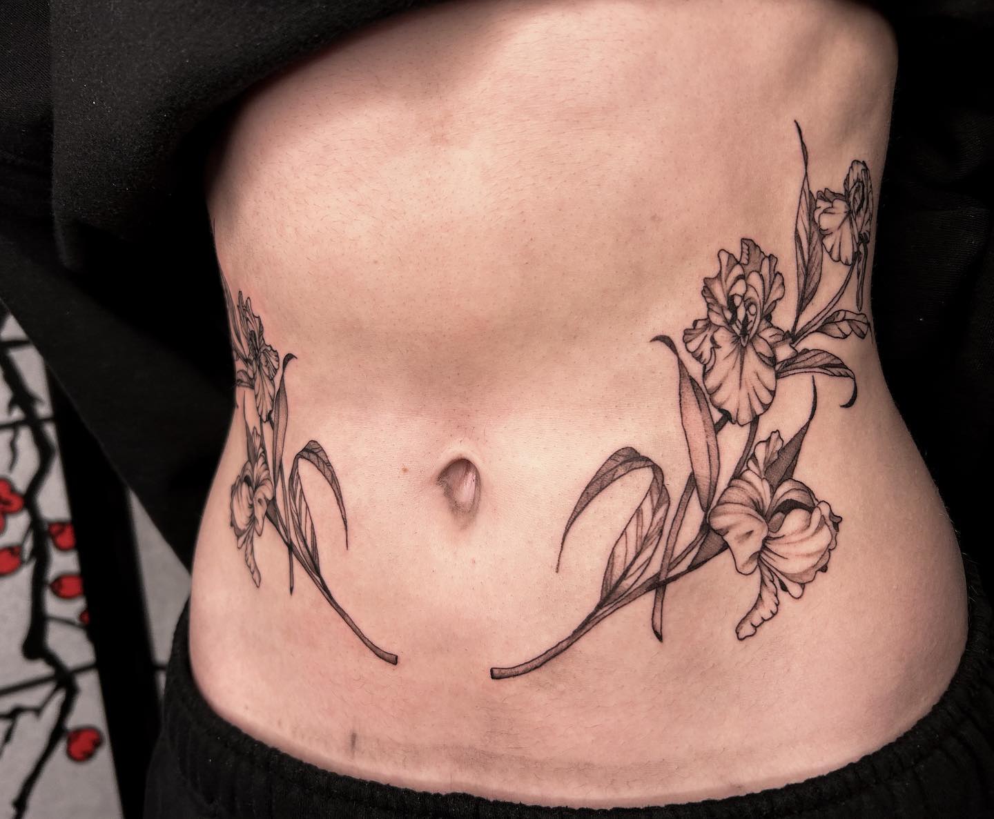 Delicate Floral Stomach Tattoo