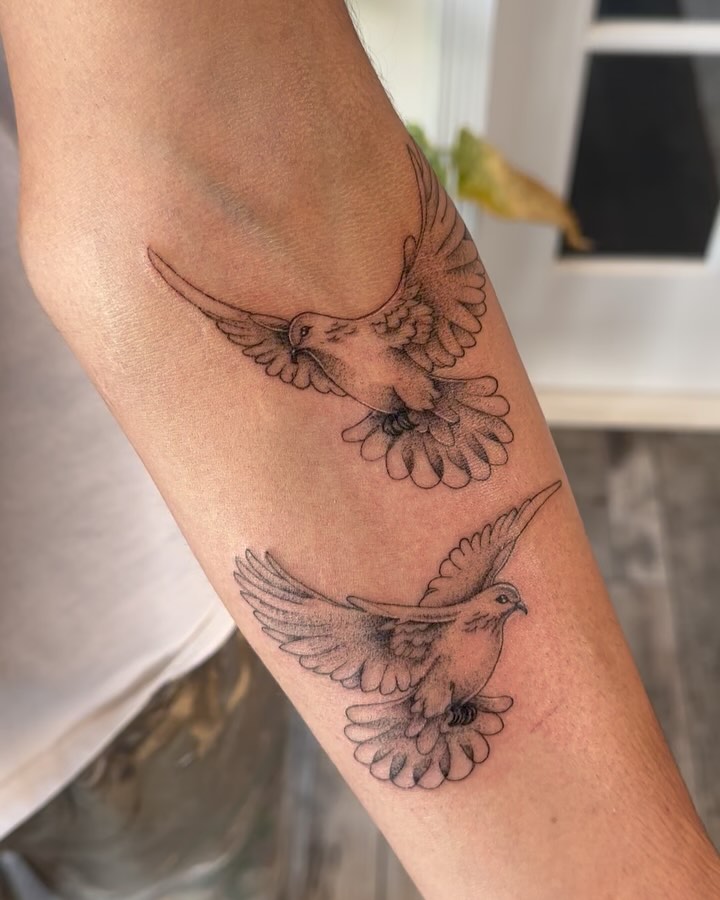 Delicate Flying Doves