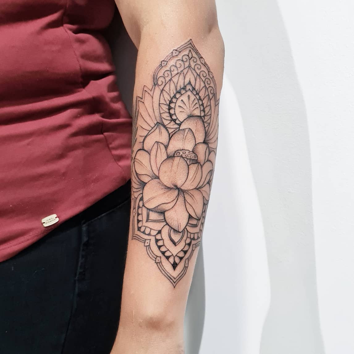 Delicate Lotus Arm Tattoo