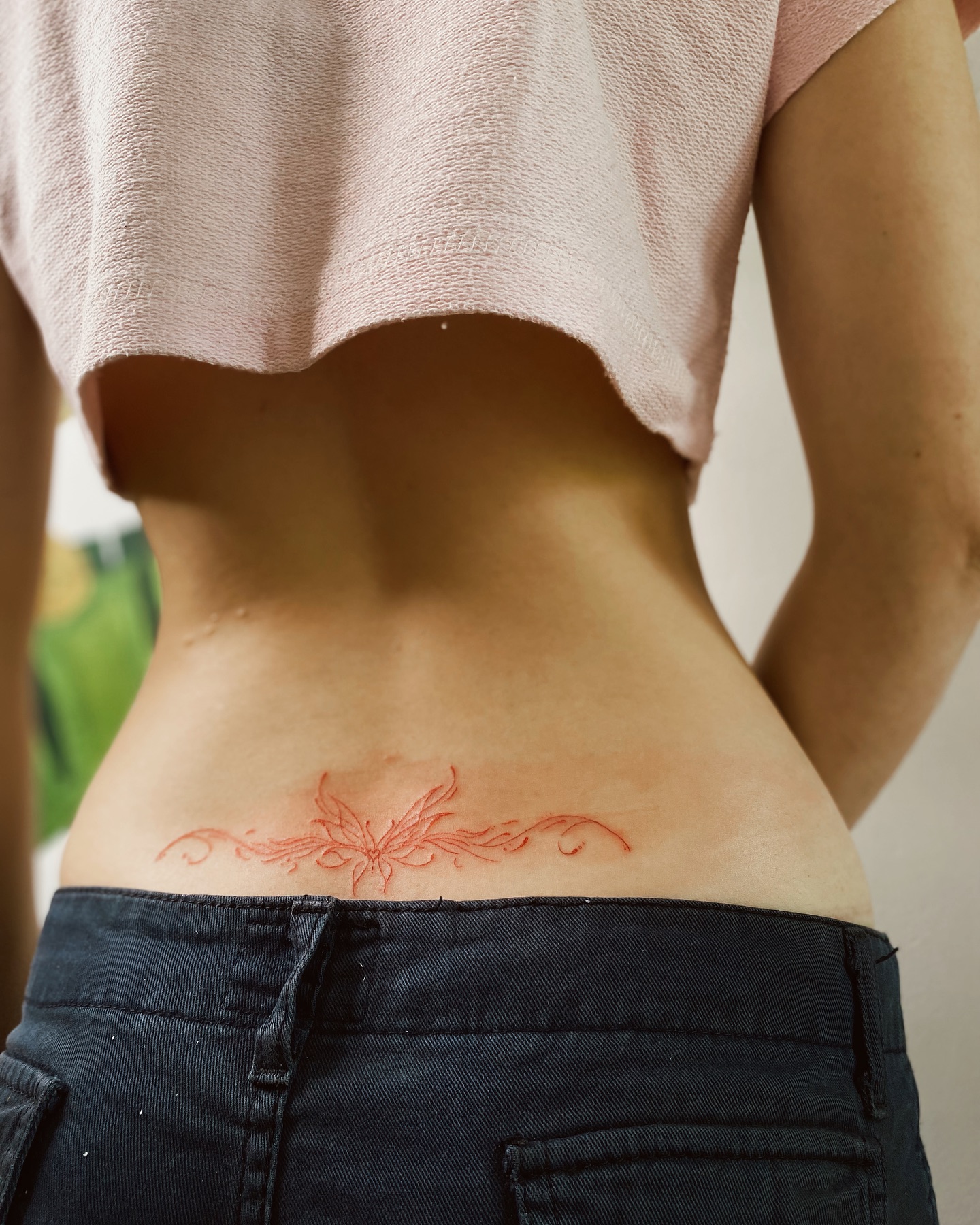 Delicate Lower Back Tattoo