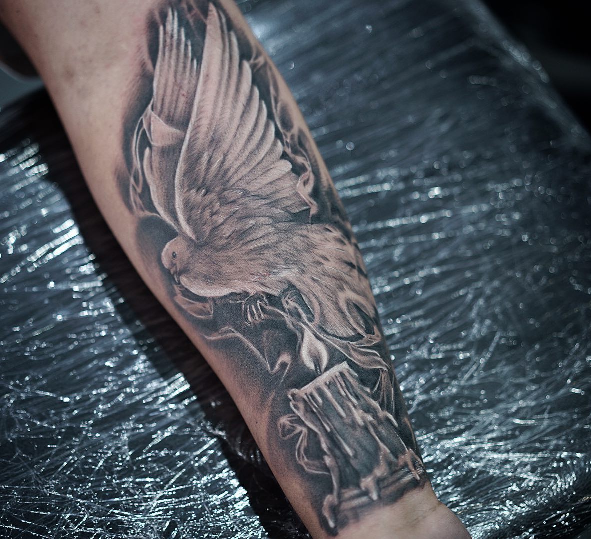 Dove and Candle Tattoo