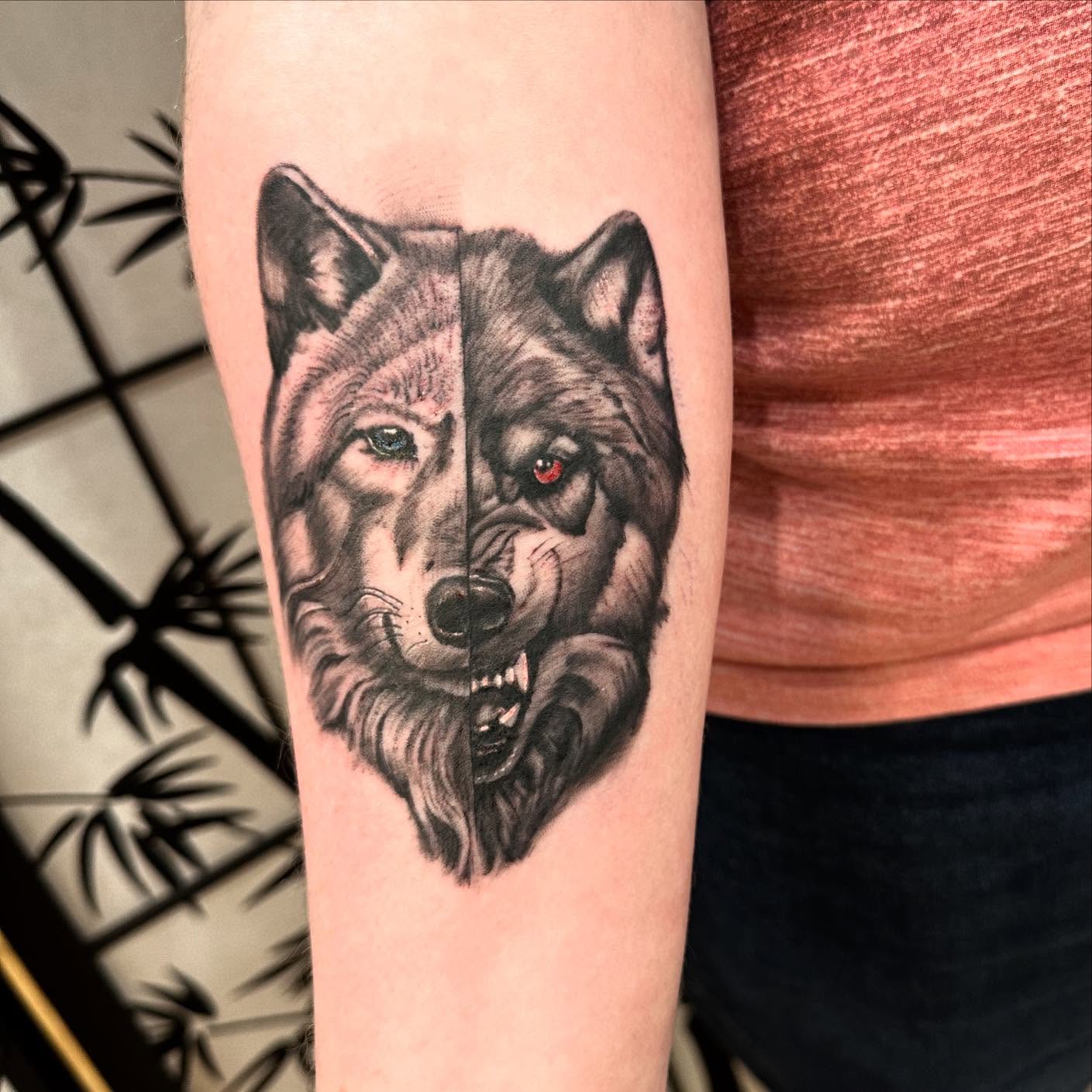 Dual Wolf Face Tattoo