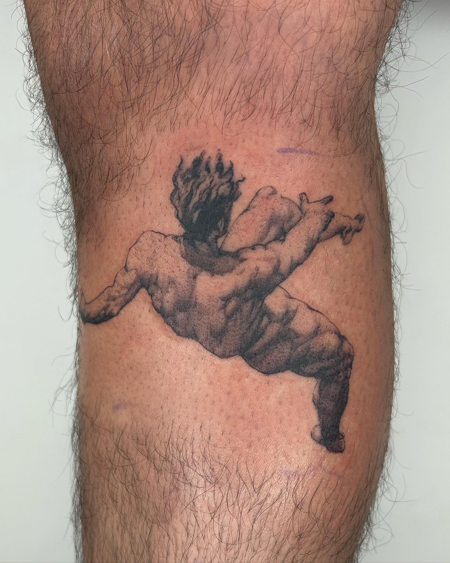 Dynamic Male Angel Tattoo