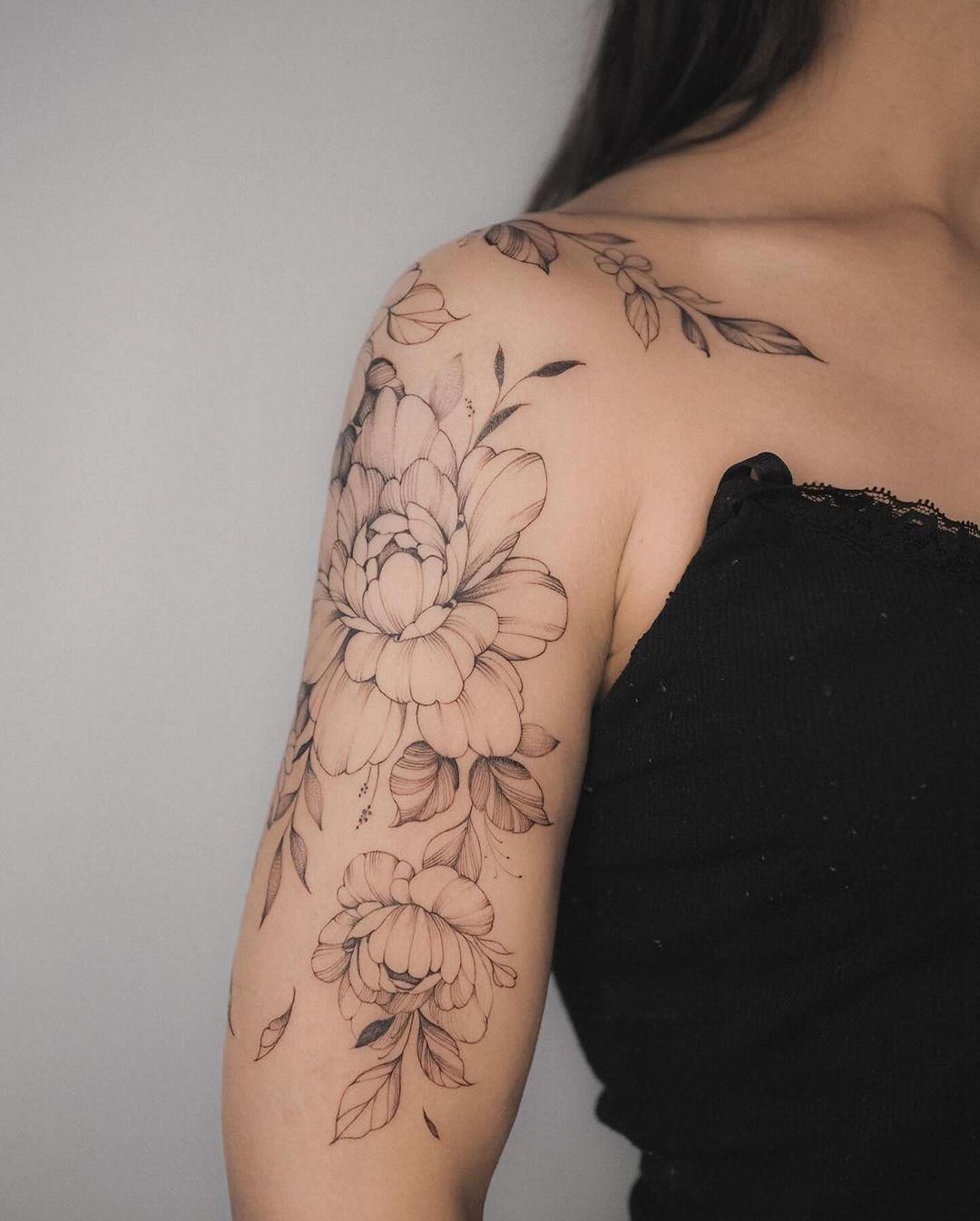 Elegant Floral Arm Tattoo