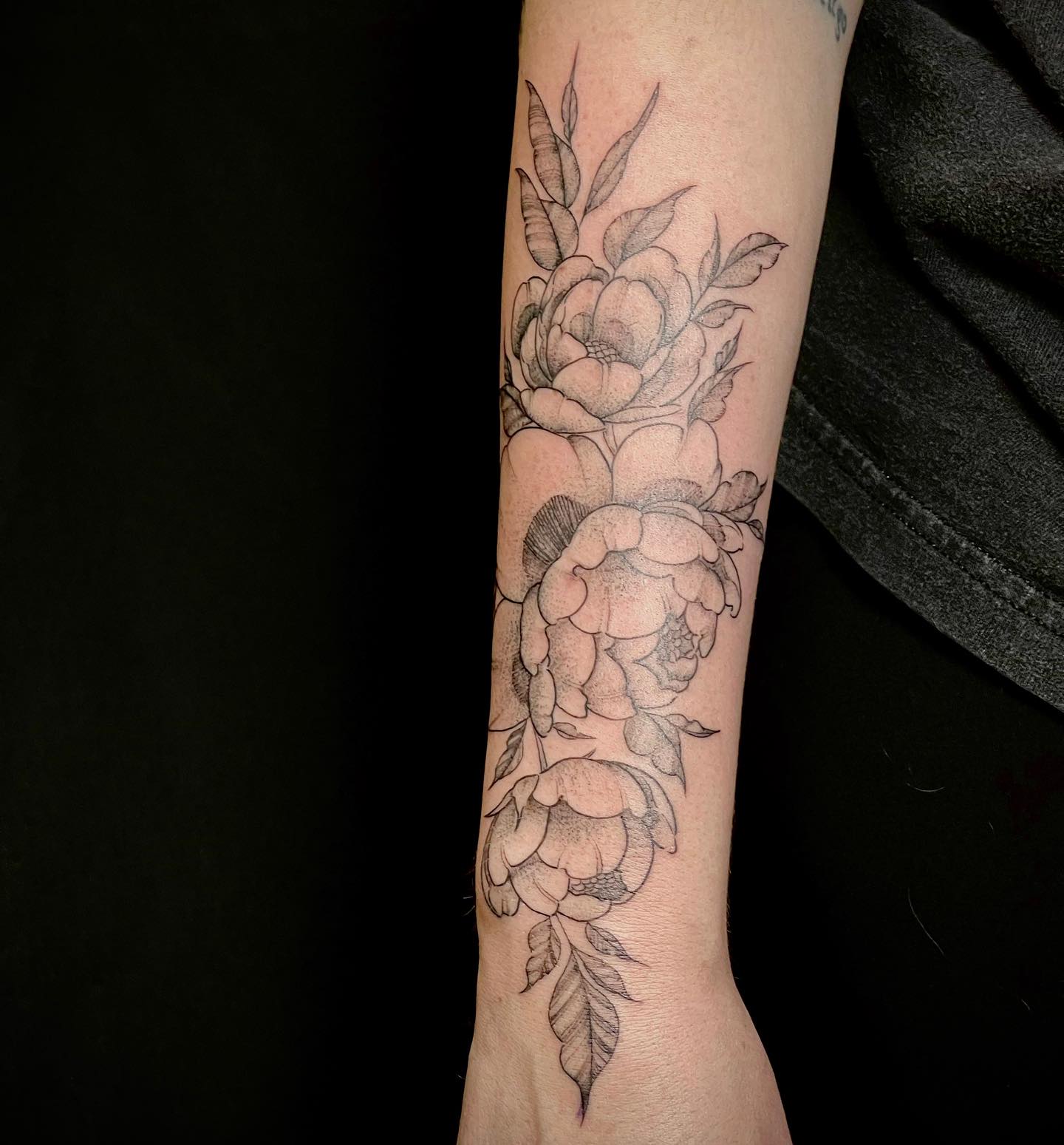 Elegant Floral Arm Tattoo