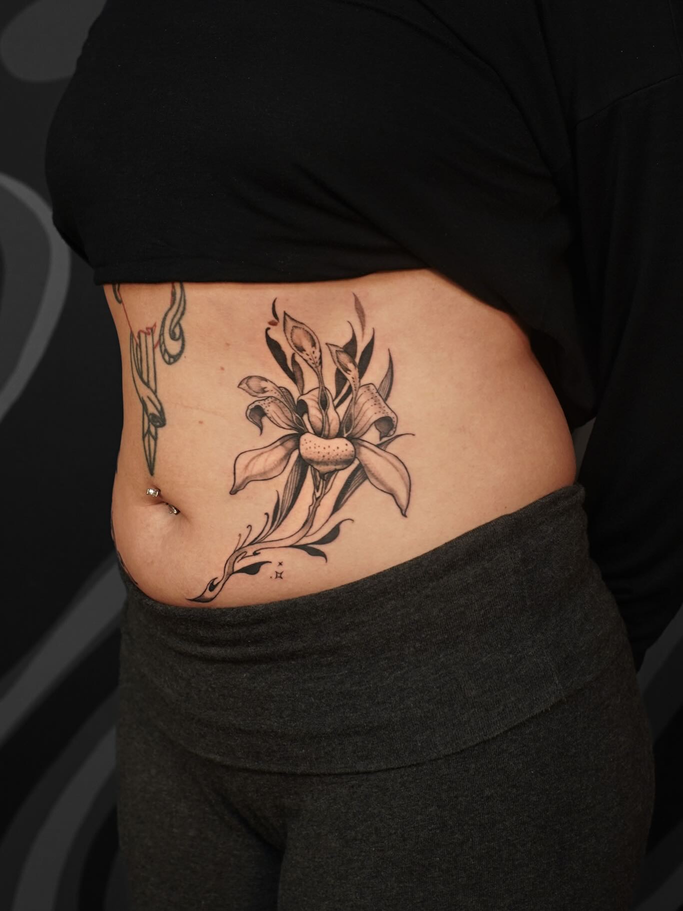Elegant Floral Stomach Tattoo