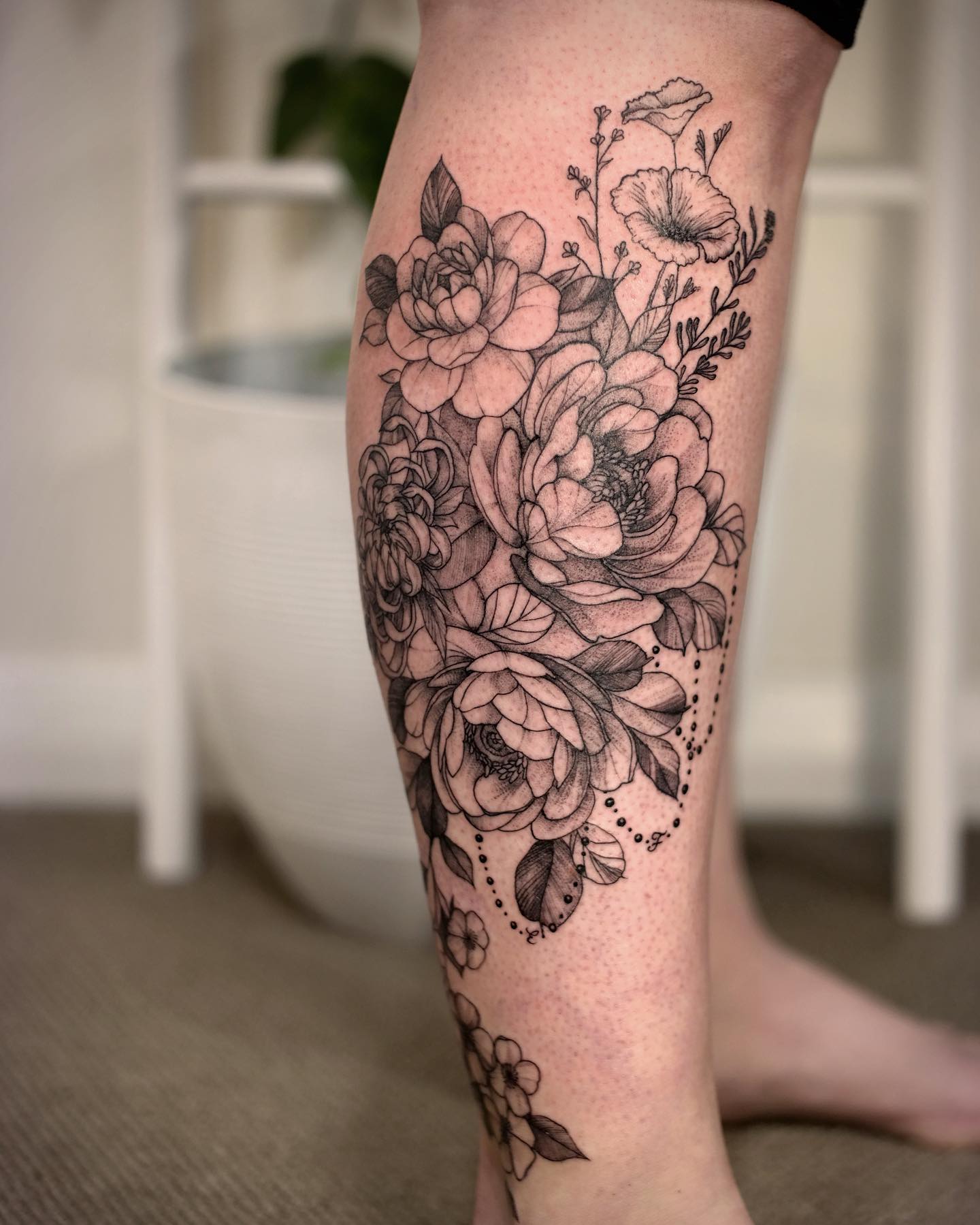 Elegant Floral Calf Tattoo