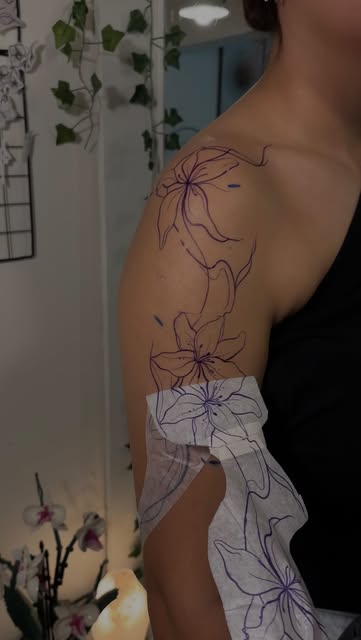 Elegant Floral Outline Tattoo