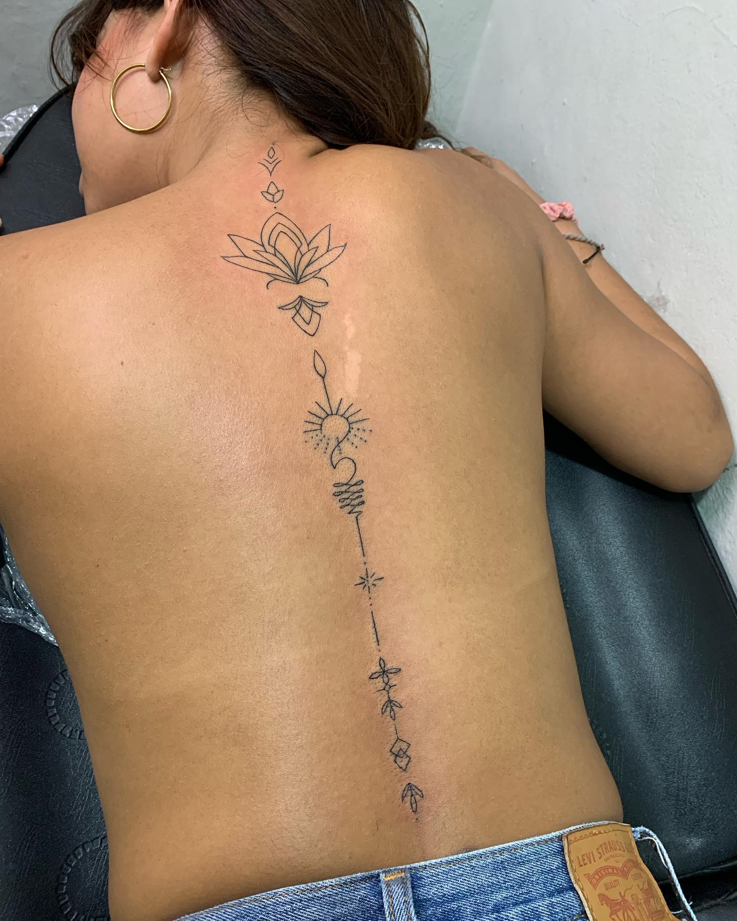 Elegant Spine Line Tattoo