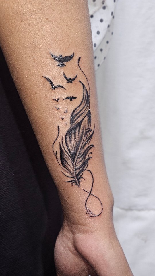 Feather Flight Tattoo