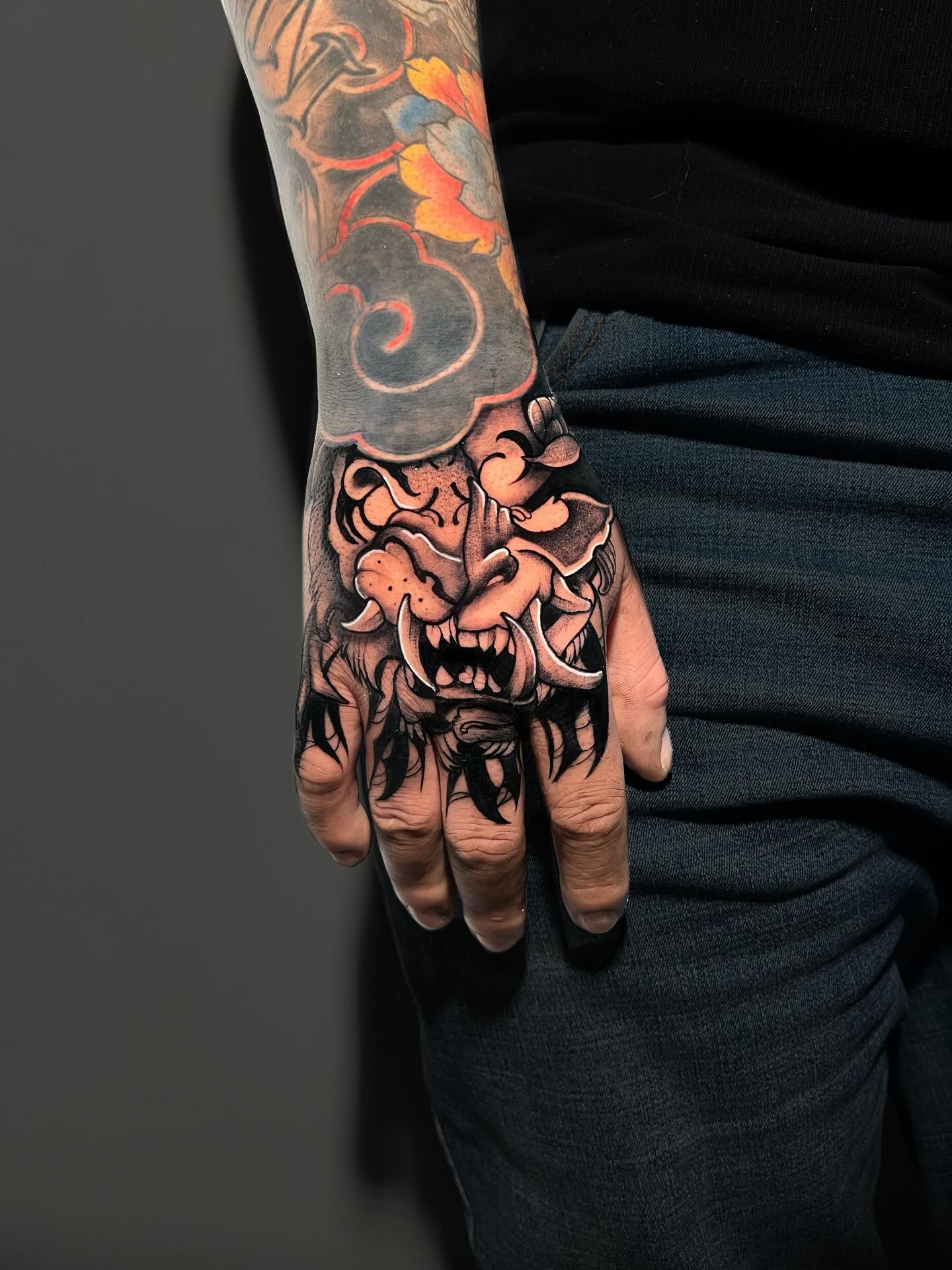 Fierce Tiger Hand Tattoo