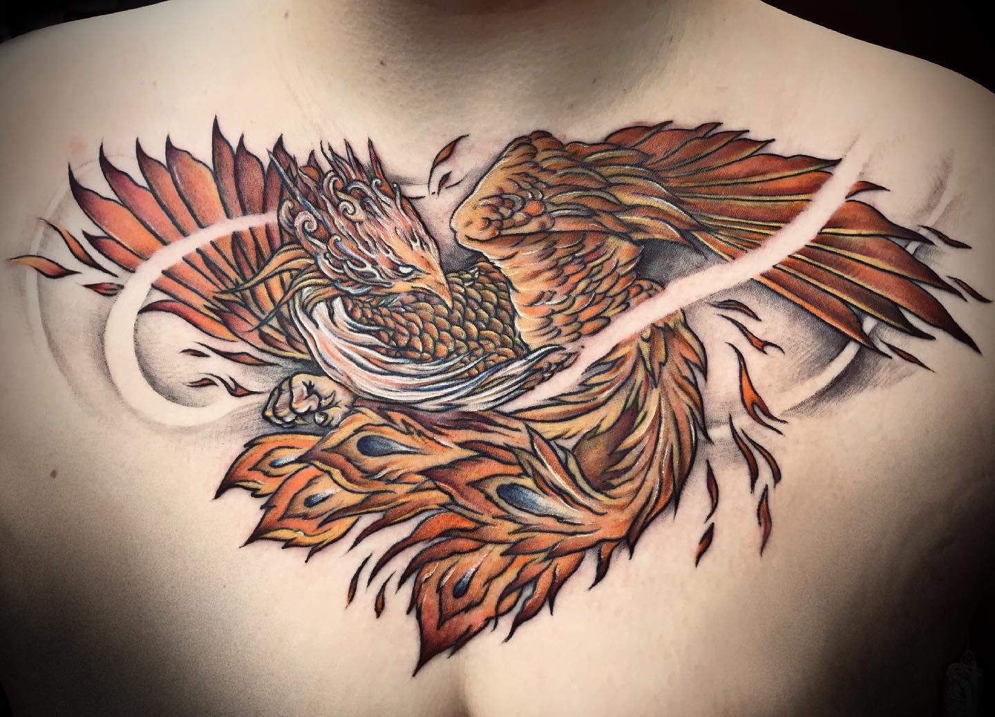 Fiery Phoenix Chest Tattoo