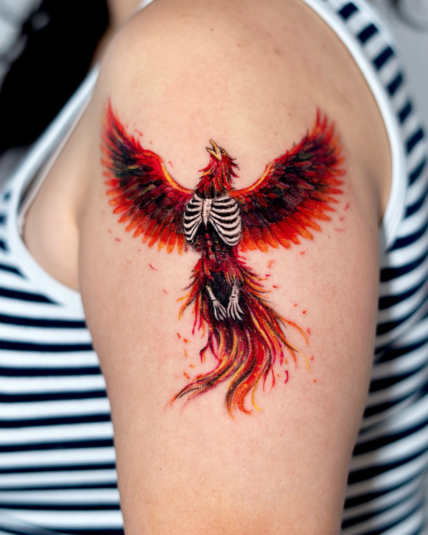 Fiery Phoenix Skeleton Tattoo