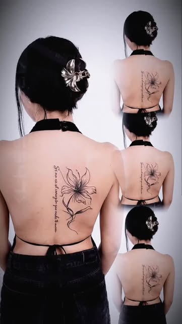 Dainty floral back tattoos