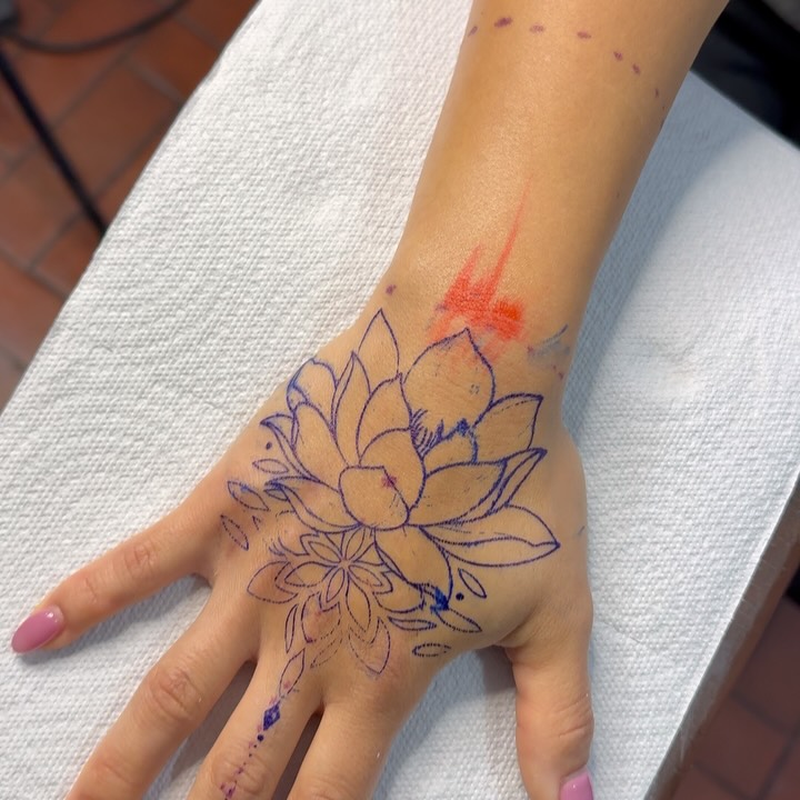 Floral Hand Outline Tattoo