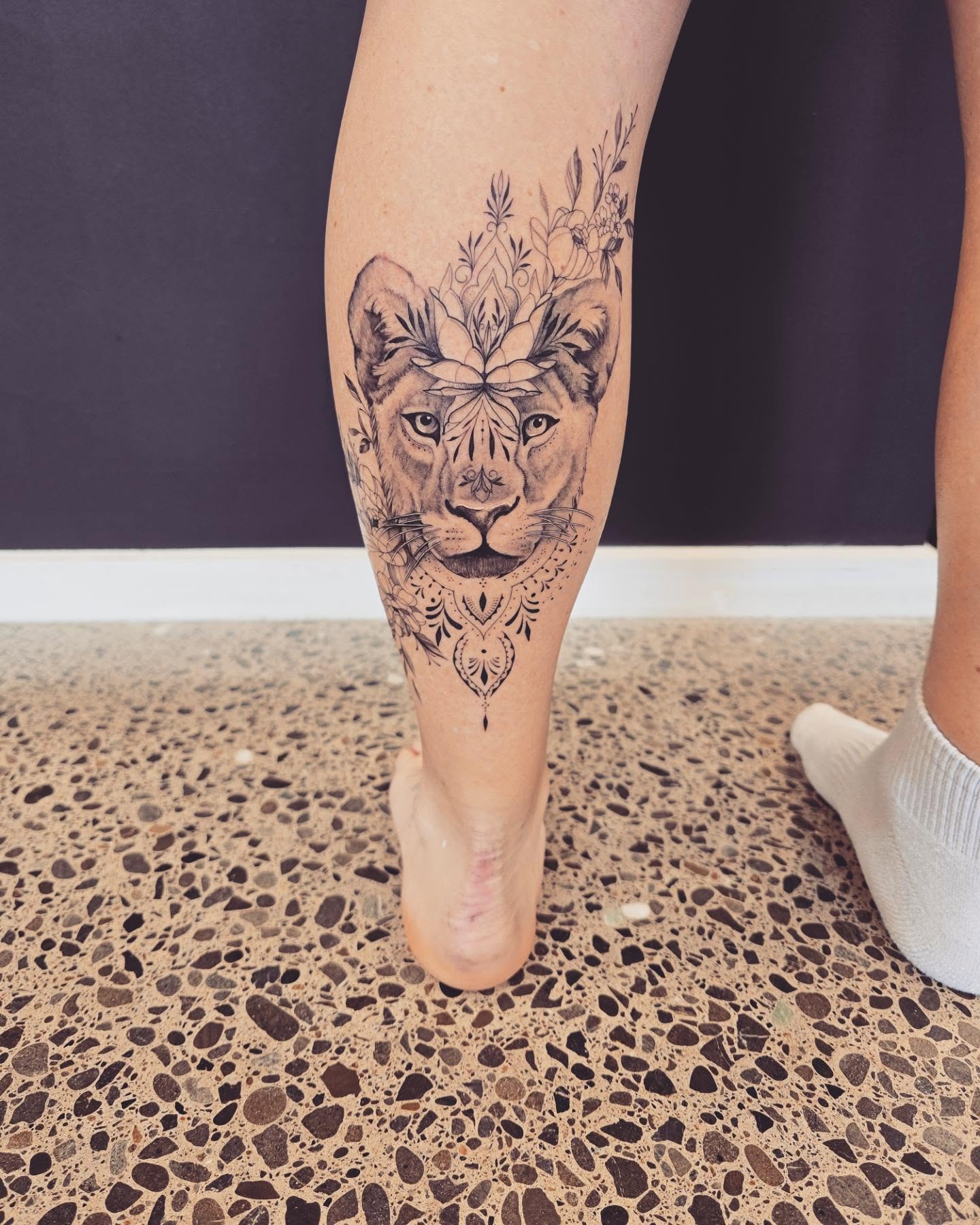 Floral Lioness Calf Tattoo