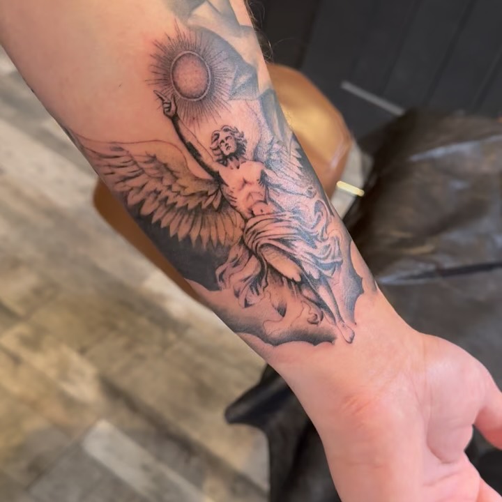 Graceful Angel Forearm Tattoo