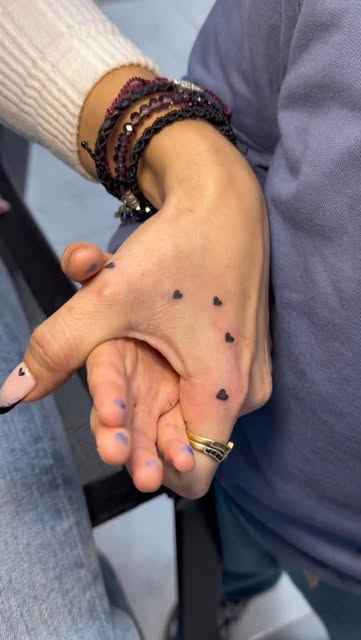 Dots de mano