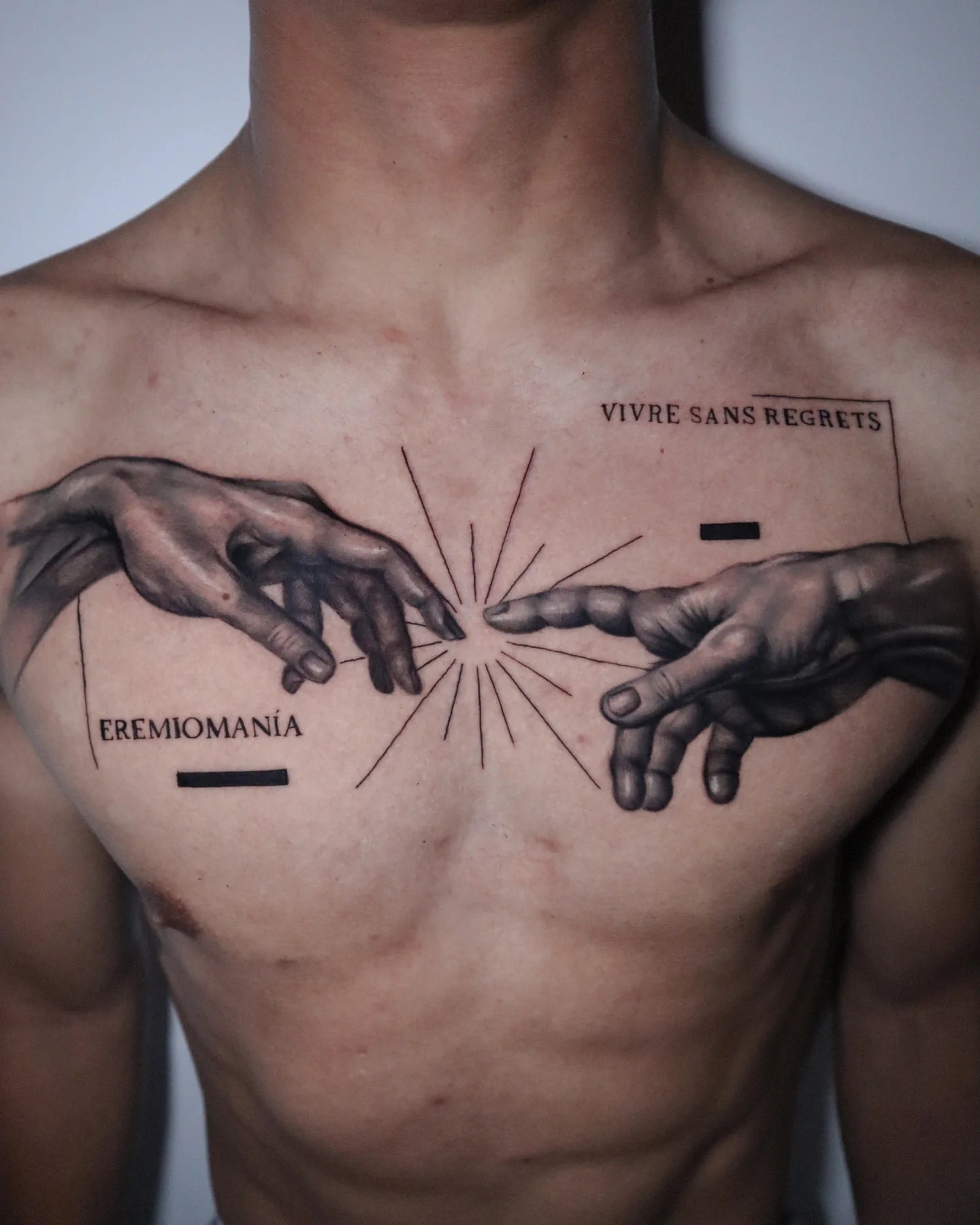 Hands Connecting Chest Tattoo