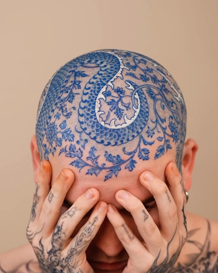 Intricate Blue Head Tattoo