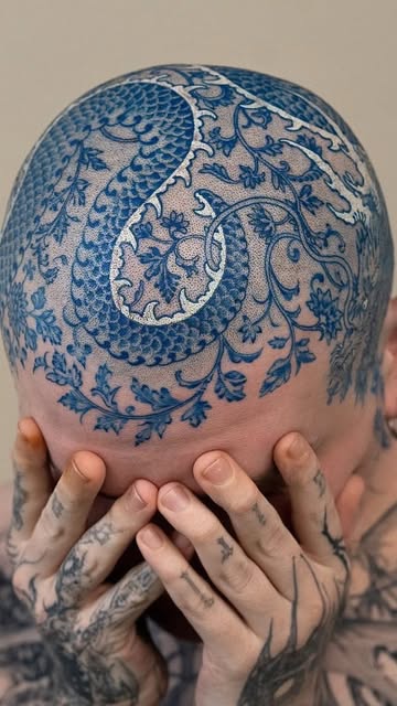 Intricate Blue Head Tattoo