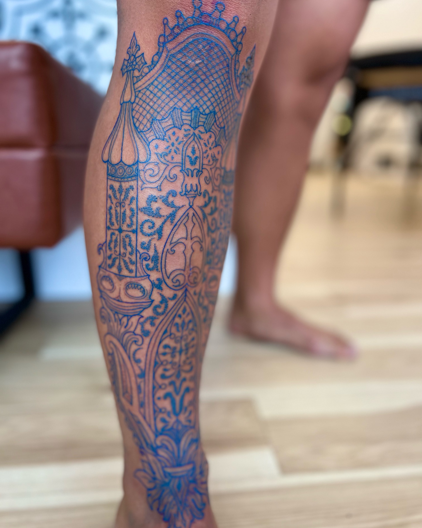 Intricate Blue Lacework Tattoo
