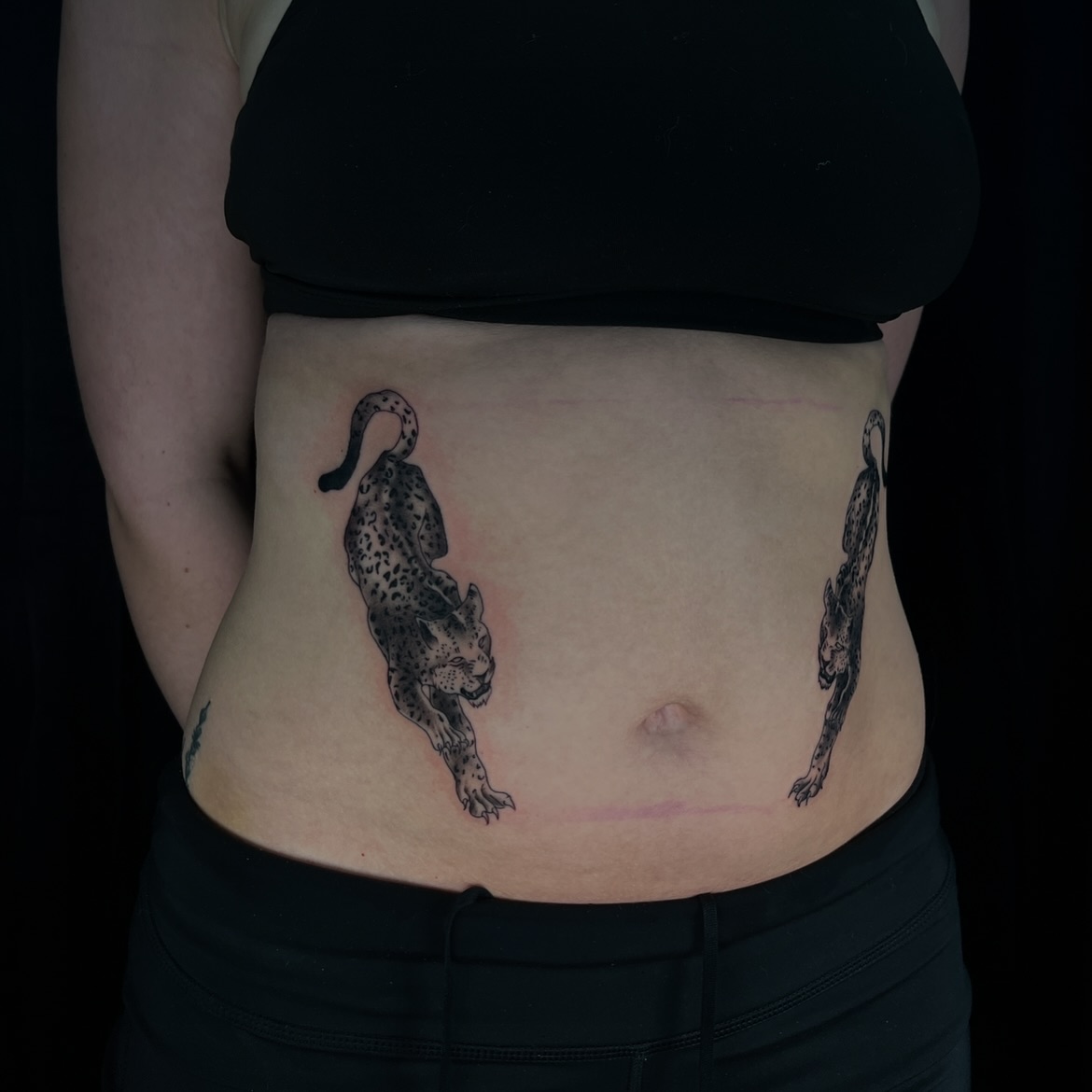 Leaping Cat Belly Tattoo
