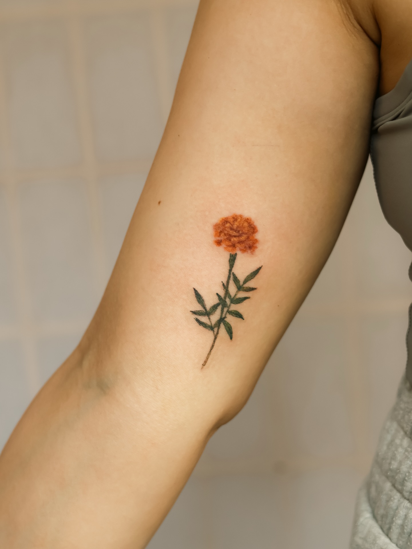 Marigold Stem Tattoo