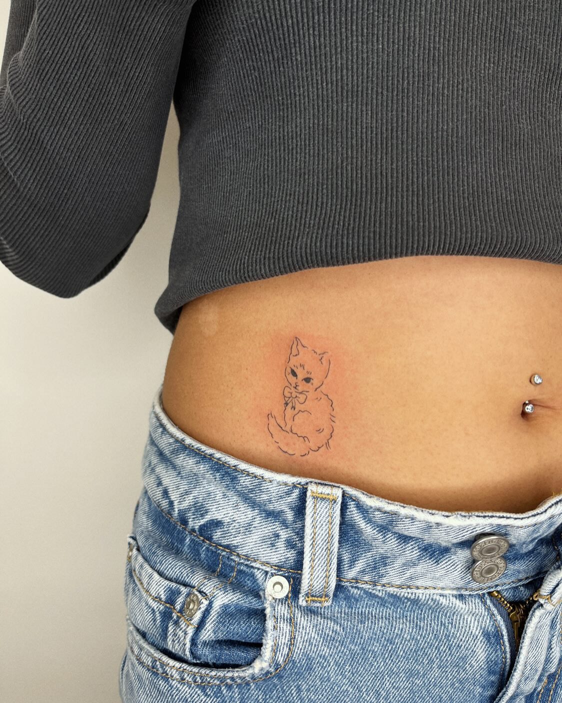 Minimalist Cat Tattoo